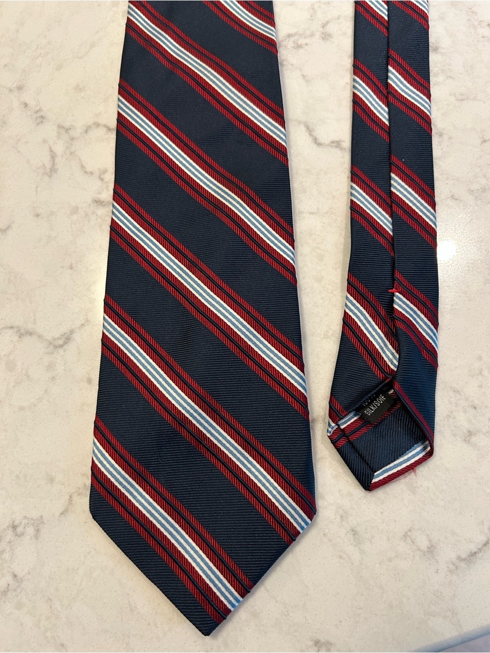 Harry Rosen silk handmade Navy Stripe Men's Tie with Red and White Accents